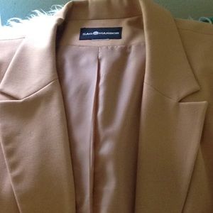 Two-piece Gaberdine suit is classic career wear.